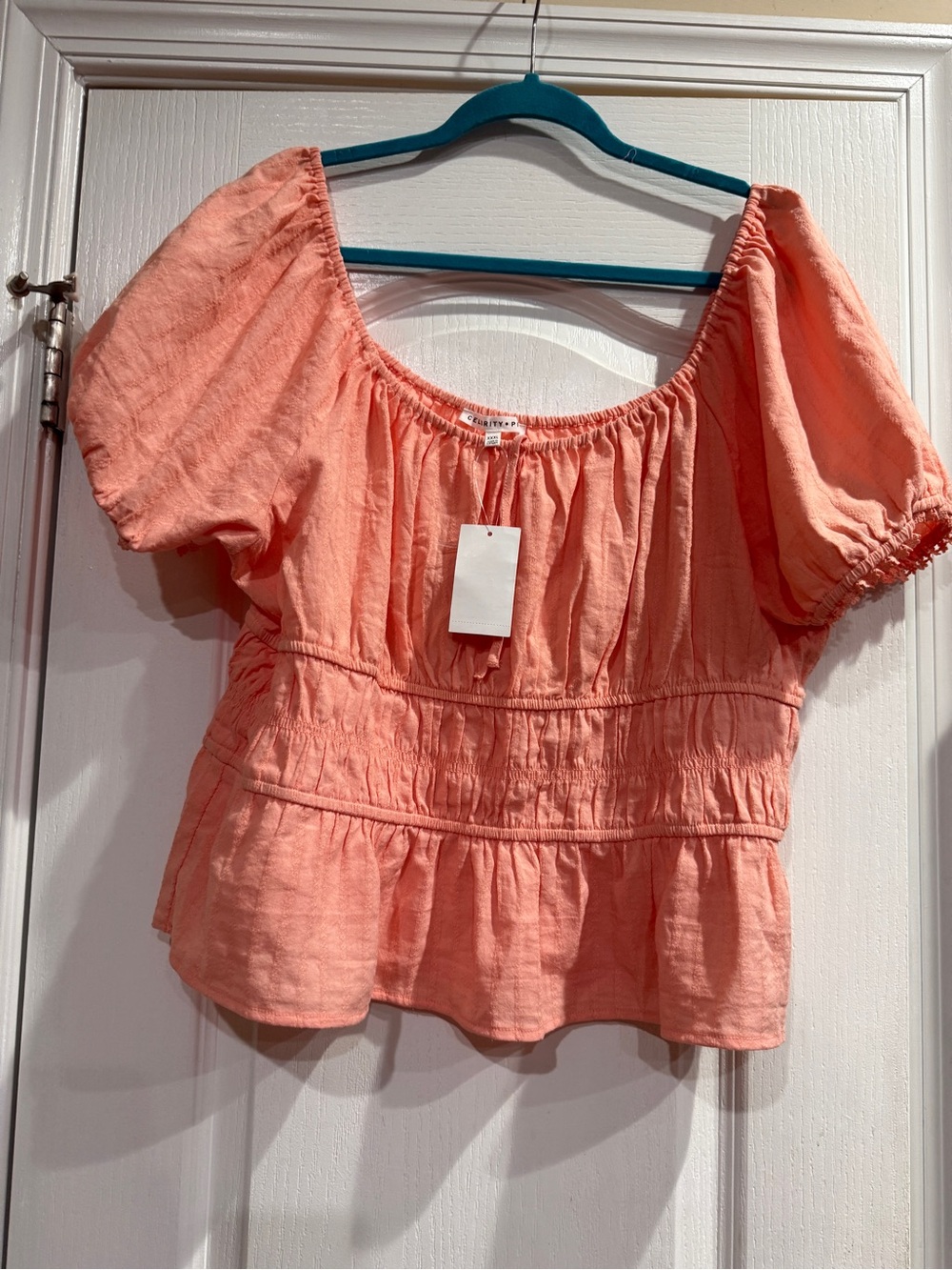 Celebrity Pink Coral Peplum Smocked Blouse